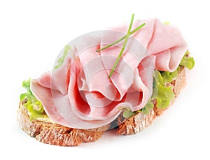 Open ham sandwich on rye bread