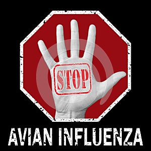 Open hand with the text stop avian influenza. Global problem photo