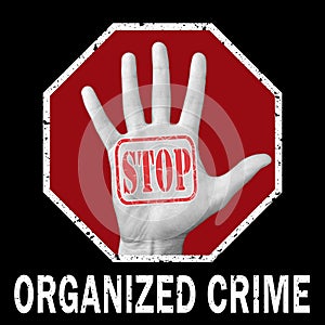 Open hand with the text stop crime organized. Global social problem