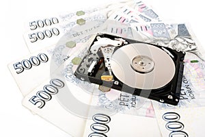 The open hard disk, with czech money banknotes