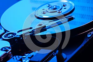 Open hard drive in blue light