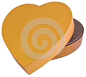 Open heart shaped golden chocolate box isolated