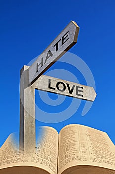 Open holy bible love hate arrows direction sign post