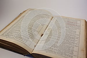 Open Holy Bible with Worn Edges