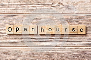 Open Hourse word written on wood block. Open Hourse text on table, concept