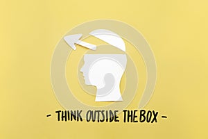 open human brain with arrow symbol near think outside box message. High quality beautiful photo concept