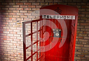 Open iconic red British telephone booth