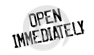 Open Immediately rubber stamp photo