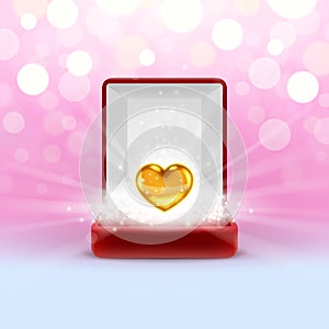 Open jewelry box with gold heart