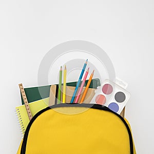 Open knapsack with school accessories . High quality and resolution beautiful photo concept