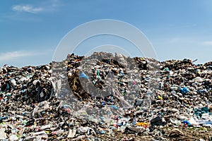 Open landfill of household waste. A lot of plastic waste. Environmental disaster