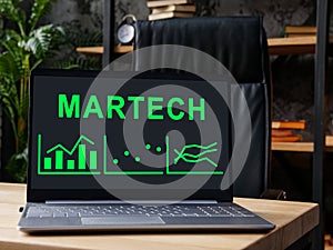 An Open laptop with MarTech Marketing technology data. photo