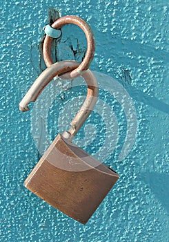 Open lock on blue photo