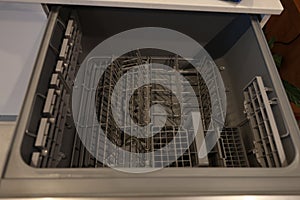 Open empty the dishwasher drawer