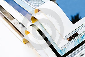 Open magazines isolated on white background