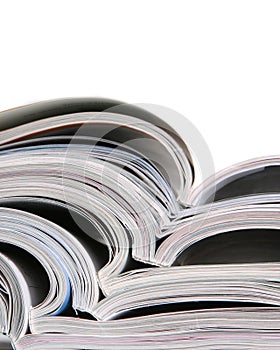 Open magazines on a white background