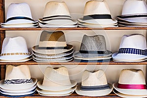 Open market stall with summer straw hats in Sozopol, Bulgaria
