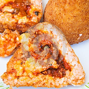 Open meat ragu stuffed rice balls arancini