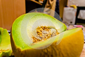 Open Melon fruit on a metal tray