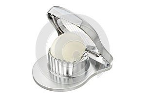 open metal design egg slicer with uncut egg isolated on white background