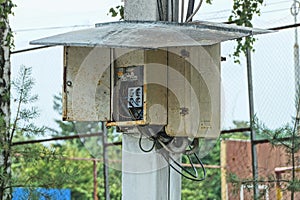 Open metal gray box with a black toggle switch