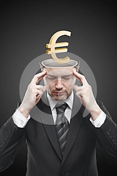 Open minded man with 3d Gold Euro Sign inside