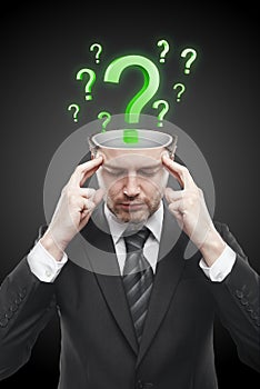 Open minded man with Green question marks inside