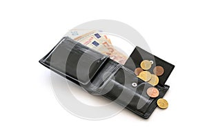 Open money purse with a few euro coins and notes, cash check, debt and poverty in the economic crisis affected by coronavirus,