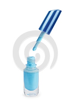 Open nail polish with a brush on a white background photo