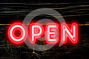 Open neon sign for welcome to customers concept