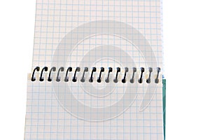 An open notebook with checkered sheets.