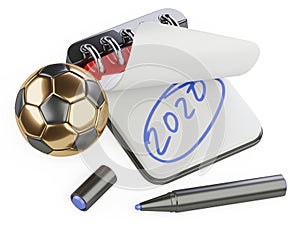 An open notebook with the inscription 2020 and a nearby golden soccer ball. Plans for the UEFA Euro