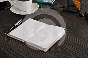 Open notebook with pen closeup