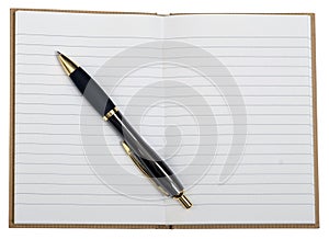 Open notebook with pen