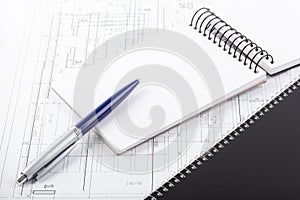 Open notebook with pen