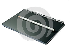 Open notebook with pencil