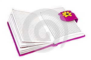 Open notebook in a purple cover on a white background