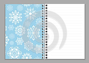 Open notebook realistic. Copybook or sketchbook, notepad or copybook with ring spiral bound pages and white snowflakes