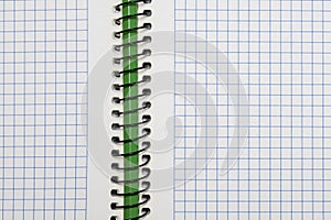 Open notebook of sheets of squared paper photo