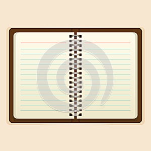 Open notebook with white page on beige background