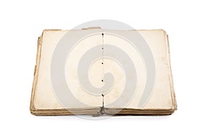 Open old book with blank yellow stained pages  on white background