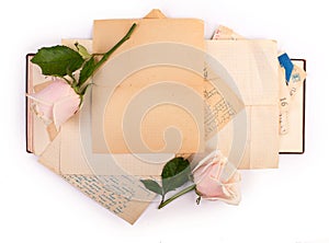 Open Old Book and roses With Copy Space Isolated on White Background