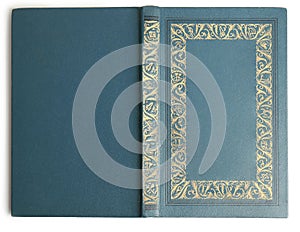 Open old book with vintage light blue cover isolated on white