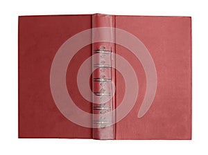 Open old book with vintage red cover isolated on white