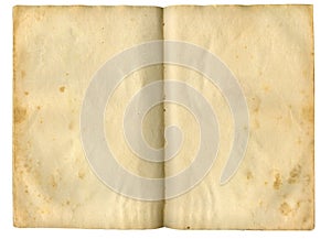 Open old book on a white background. Top view