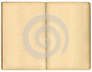 Open old book on a white background. Top view