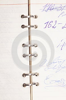 Open old notepad with written numbers.