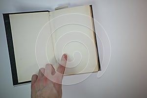 Open old Vintage book on white background