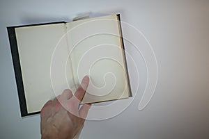 Open old Vintage book on white background