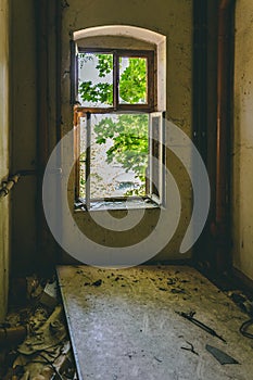 Open old window in a deserted building